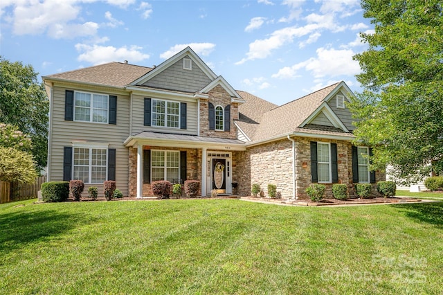 9814 Tompkins Ln, Waxhaw, NC 28173 - view of front of house with stone siding and roof with shingles