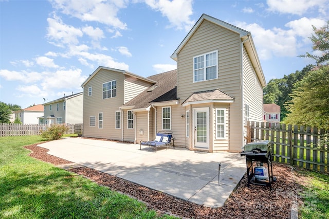 9814 Tompkins Ln, Waxhaw, NC 28173 - rear view of house with a patio, roof with shingles, and a fenced backyard