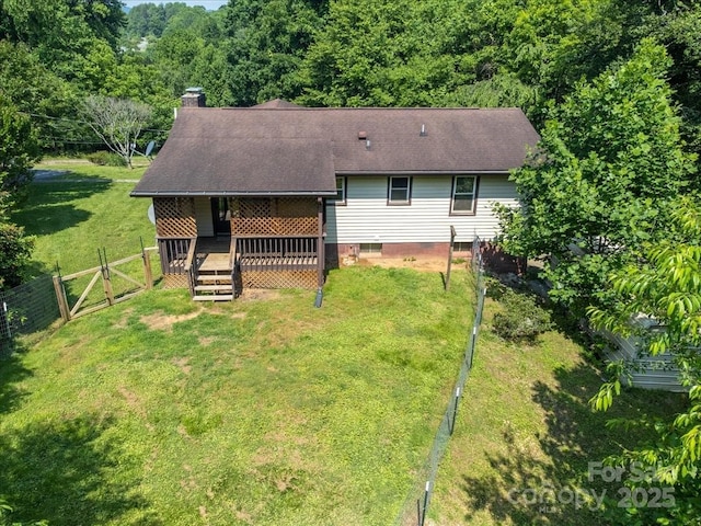 825 Pole Miller Ext, Brevard, NC 28712 - back of property featuring a deck, a chimney, and a gate