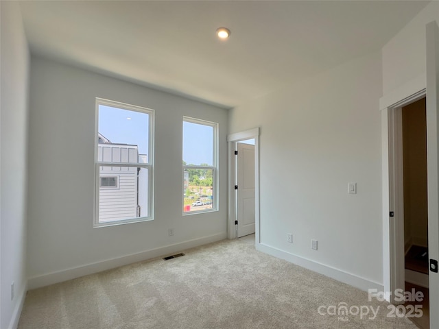 6013 Countess Dr Unit 51, Charlotte, NC 28217 - carpeted spare room featuring baseboards