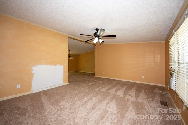 155 Springdale Acres Dr, Mooresville, NC 28115 - spare room featuring ceiling fan, carpet flooring, crown molding, a textured ceiling, and baseboards