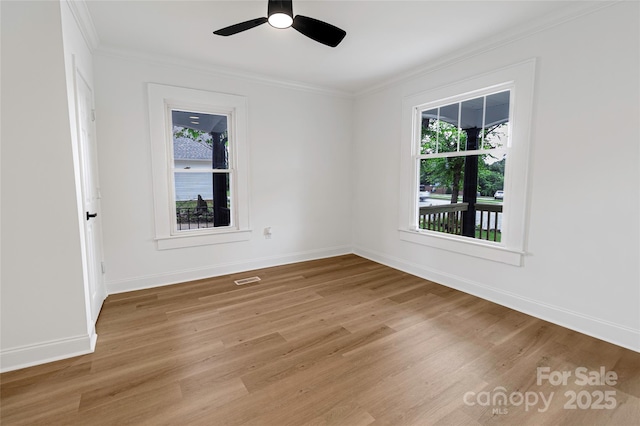 940 N New Hope Rd, Gastonia, NC 28054 - unfurnished room featuring light wood-style flooring, ornamental molding, baseboards, and a ceiling fan