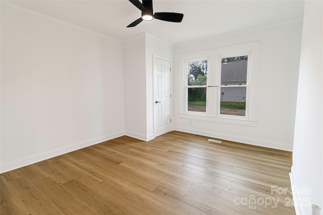 940 N New Hope Rd, Gastonia, NC 28054 - empty room with ornamental molding, light wood-style floors, baseboards, and ceiling fan
