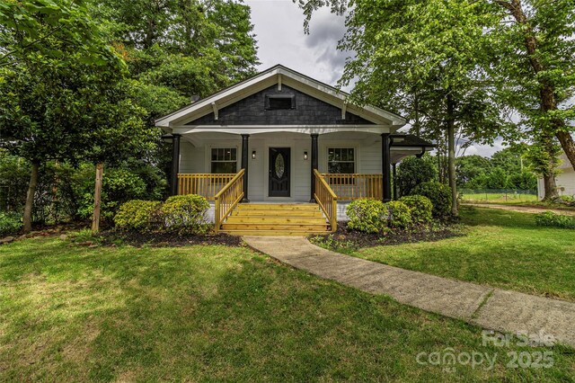 940 N New Hope Rd, Gastonia, NC 28054 - bungalow with covered porch and a front yard