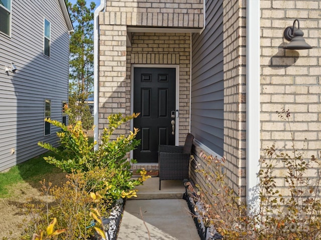 518 Palmarosa St, Fort Mill, SC 29715 - doorway to property with brick siding