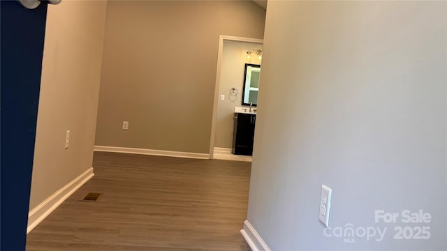 148 Forest Heights Dr, Mcadenville, NC 28101 - corridor featuring baseboards and wood finished floors