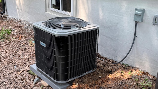 148 Forest Heights Dr, Mcadenville, NC 28101 - exterior view of central air condition unit and stucco siding