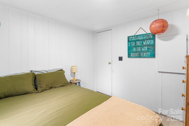 355 Dix Creek Rd, Leicester, NC 28748 - bedroom with wood finished floors