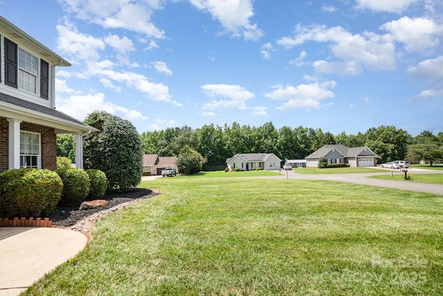600 Capella Ct, Gastonia, NC 28056 - view of grassy yard featuring a detached garage