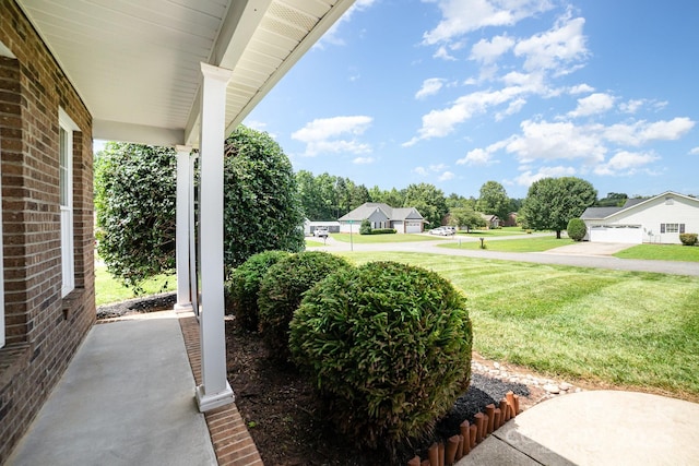600 Capella Ct, Gastonia, NC 28056 - view of grassy yard with covered porch