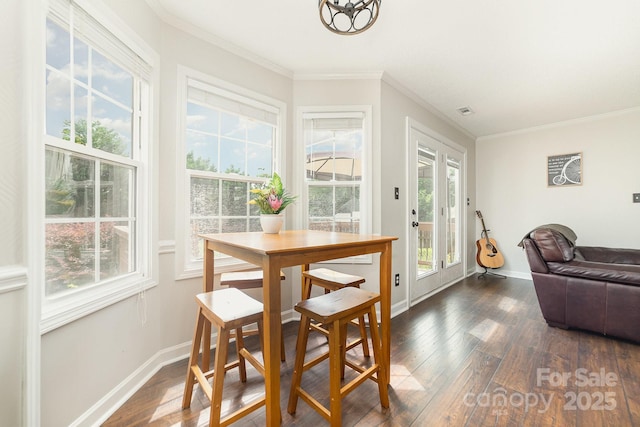 600 Capella Ct, Gastonia, NC 28056 - dining space with dark wood finished floors and crown molding