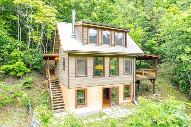 1146 Thomas Branch Rd, Marshall, NC 28753 - view of front of home featuring stairway, metal roof, a forest view, and a wooden deck
