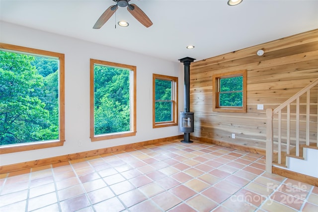 1146 Thomas Branch Rd, Marshall, NC 28753 - unfurnished room featuring wood walls, baseboards, recessed lighting, light tile patterned floors, and a ceiling fan
