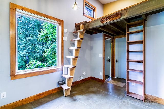 1146 Thomas Branch Rd, Marshall, NC 28753 - interior space featuring baseboards and concrete flooring
