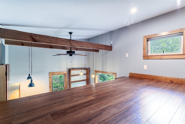1146 Thomas Branch Rd, Marshall, NC 28753 - unfurnished room featuring healthy amount of natural light, a ceiling fan, wood finished floors, and baseboards