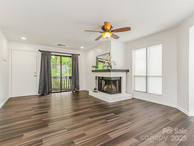 8183 Cedar Glen Dr, Charlotte, NC 28212 - unfurnished living room with a brick fireplace, ceiling fan, wood finished floors, recessed lighting, and baseboards
