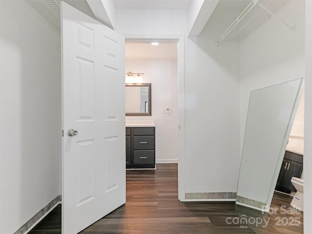 8183 Cedar Glen Dr, Charlotte, NC 28212 - walk in closet with dark wood-style floors