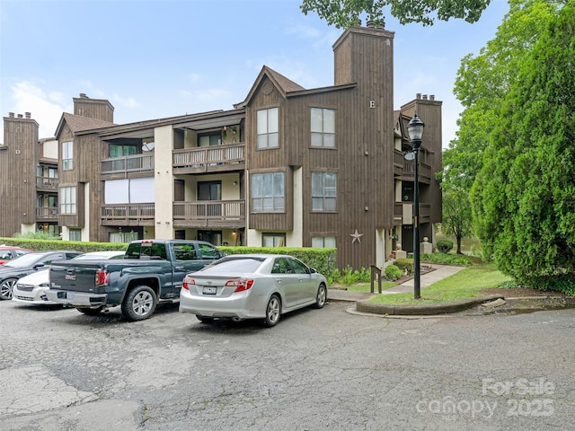 8183 Cedar Glen Dr, Charlotte, NC 28212 - view of building exterior featuring uncovered parking