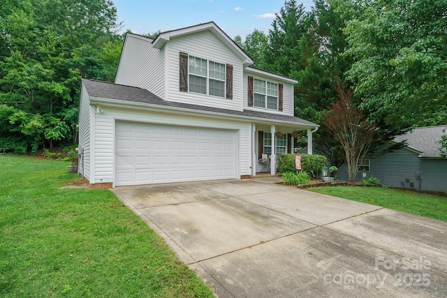 1912 8th St SE, Hickory, NC 28602 - traditional home with a front yard, a porch, and driveway