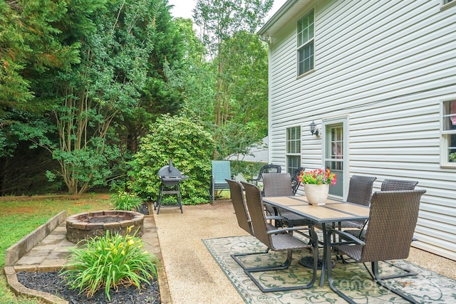 1912 8th St SE, Hickory, NC 28602 - view of patio featuring an outdoor fire pit, outdoor dining area, and grilling area