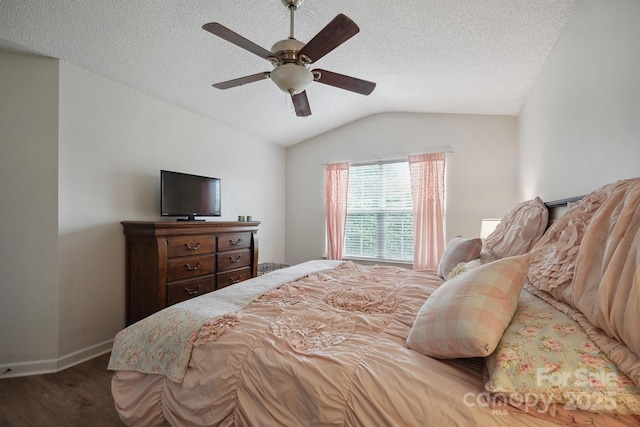 1912 8th St SE, Hickory, NC 28602 - bedroom with wood finished floors, lofted ceiling, baseboards, a textured ceiling, and a ceiling fan