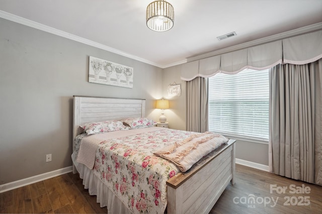 1912 8th St SE, Hickory, NC 28602 - bedroom with ornamental molding, baseboards, and wood finished floors