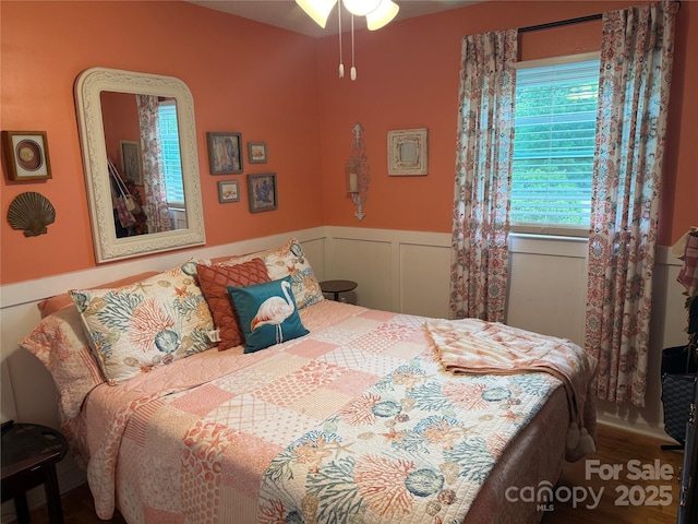 1895 Sandy Cir, Newton, NC 28658 - bedroom featuring a wainscoted wall and wood finished floors