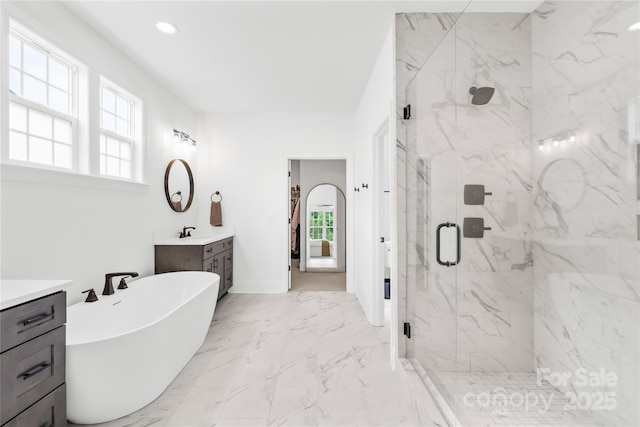 126 Still Creek Dr, Mooresville, NC 28115 - bathroom featuring vanity, a marble finish shower, a freestanding bath, marble finish flooring, and healthy amount of natural light
