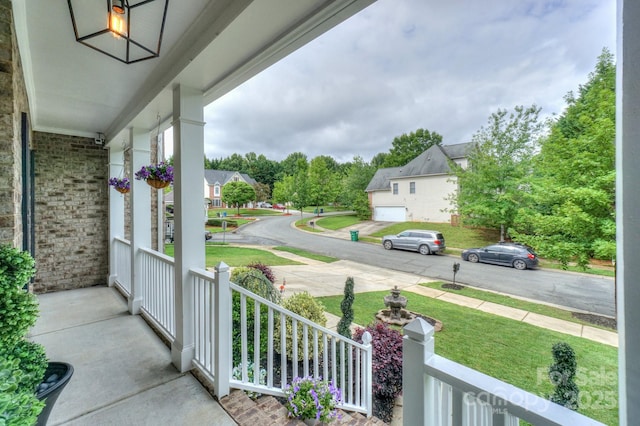 10304 Squires Way Unit 18, Cornelius, NC 28031 - covered porch with a yard