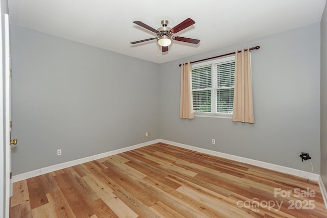 10304 Squires Way Unit 18, Cornelius, NC 28031 - empty room with baseboards, ceiling fan, and light wood-style flooring