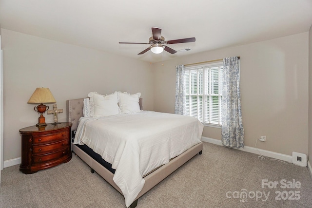 10304 Squires Way Unit 18, Cornelius, NC 28031 - carpeted bedroom with baseboards and ceiling fan