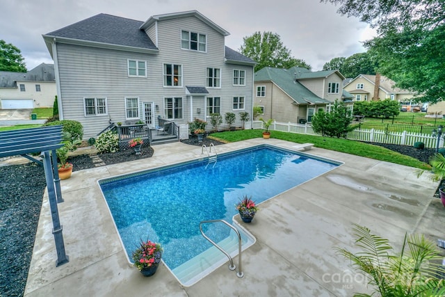10304 Squires Way Unit 18, Cornelius, NC 28031 - view of pool featuring a wooden deck, a patio, and a residential view
