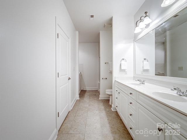 10875 Casetta Dr, Matthews, NC 28105 - bathroom featuring double vanity and tile patterned flooring