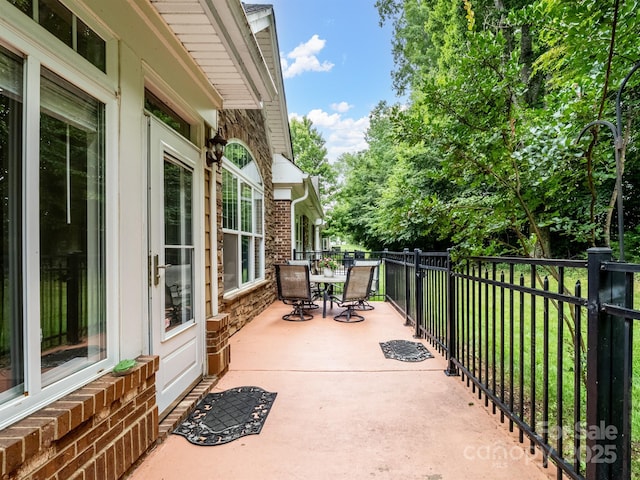 10875 Casetta Dr, Matthews, NC 28105 - view of patio with outdoor dining area