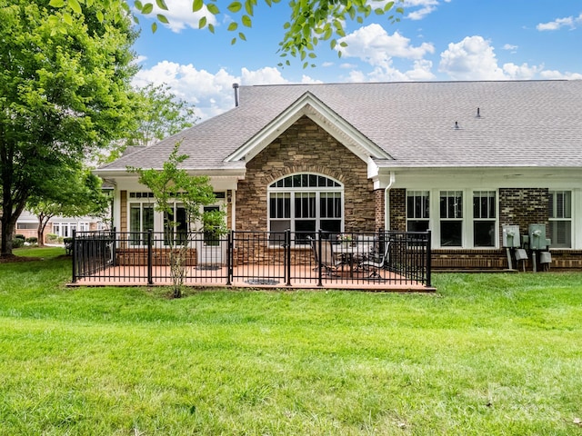 10875 Casetta Dr, Matthews, NC 28105 - back of house with a patio area, a yard, stone siding, and a shingled roof