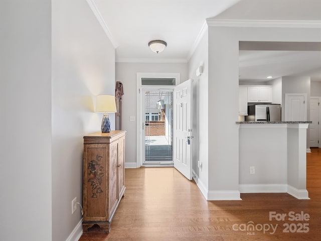 10875 Casetta Dr, Matthews, NC 28105 - hallway featuring wood finished floors and ornamental molding