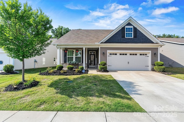 7809 Creek Park Dr, Denver, NC 28037 - view of front of home featuring stone siding, a front lawn, driveway, and an attached garage