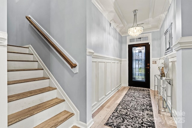 7809 Creek Park Dr, Denver, NC 28037 - entrance foyer with a chandelier, stairway, light wood-type flooring, and crown molding