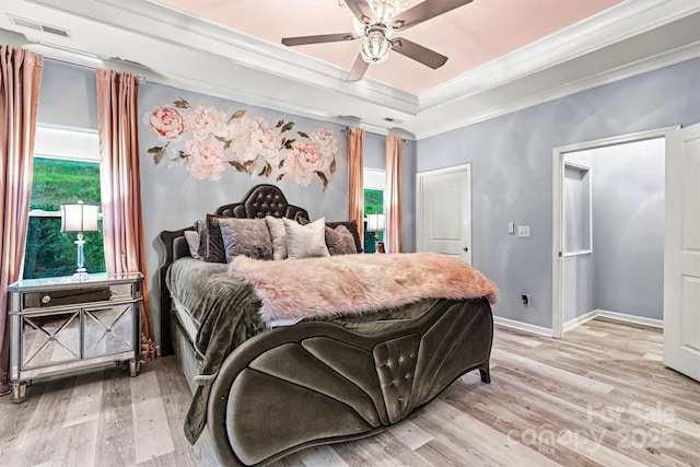 7809 Creek Park Dr, Denver, NC 28037 - bedroom with ornamental molding, light wood-type flooring, a raised ceiling, baseboards, and a ceiling fan