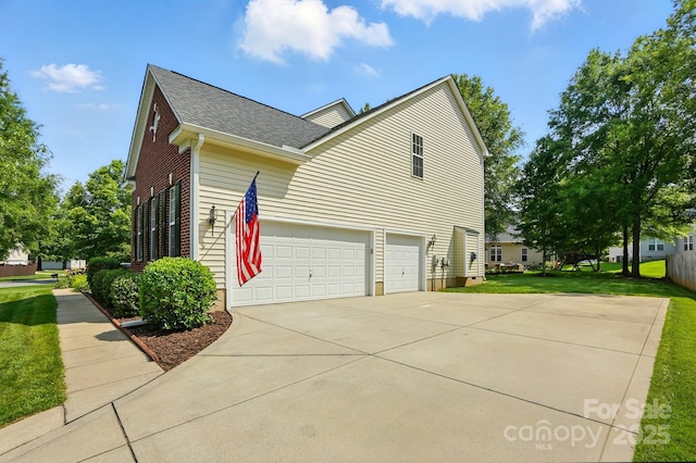 415 Glandon Ct, Fort Mill, SC 29708 - view of property exterior featuring concrete driveway, a shingled roof, a yard, and a garage