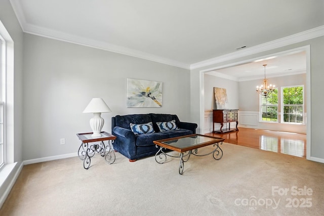 415 Glandon Ct, Fort Mill, SC 29708 - carpeted living room with ornamental molding, a chandelier, and baseboards