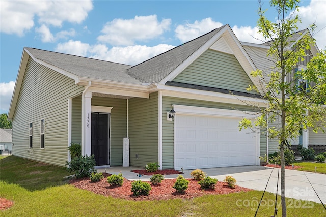 1770 Troon Dr, Salisbury, NC 28144 - view of front of house with concrete driveway, a front lawn, a garage, and roof with shingles