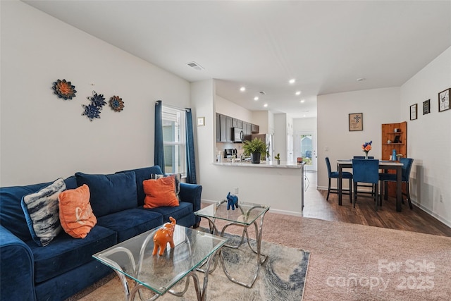1770 Troon Dr, Salisbury, NC 28144 - living room featuring dark colored carpet and recessed lighting