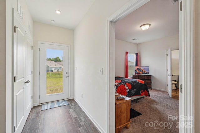 1770 Troon Dr, Salisbury, NC 28144 - doorway to outside featuring baseboards and wood finished floors