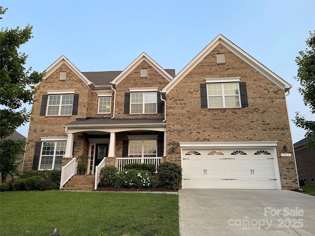 707 Five Leaf Ln, Waxhaw, NC 28173 - traditional home featuring brick siding, concrete driveway, a front yard, an attached garage, and a porch