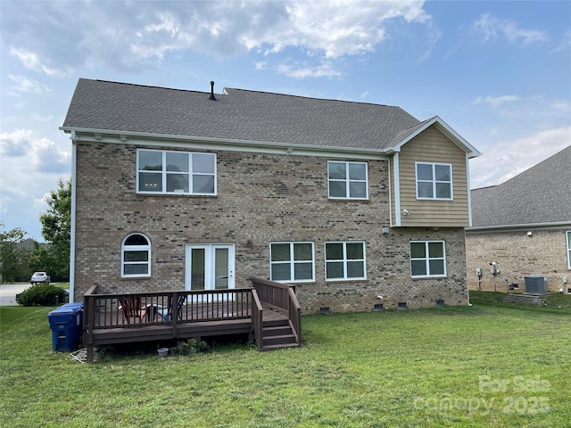 707 Five Leaf Ln, Waxhaw, NC 28173 - back of house featuring a wooden deck, brick siding, cooling unit, and a yard