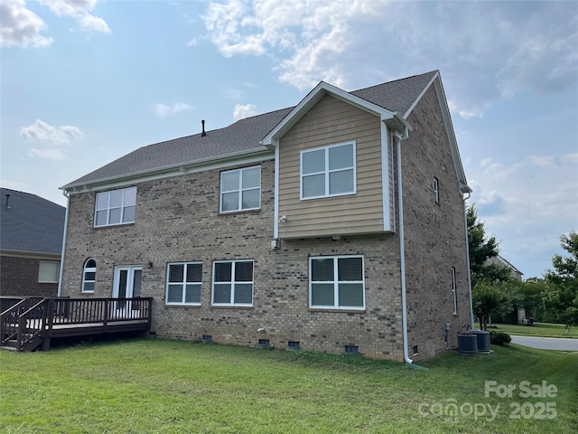 707 Five Leaf Ln, Waxhaw, NC 28173 - back of house with crawl space, a wooden deck, a lawn, brick siding, and central AC unit