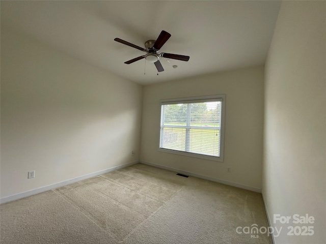 707 Five Leaf Ln, Waxhaw, NC 28173 - unfurnished room featuring baseboards, light colored carpet, and ceiling fan