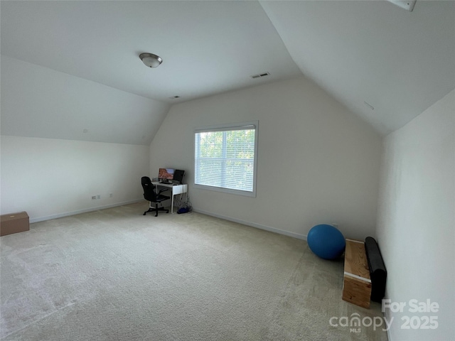 707 Five Leaf Ln, Waxhaw, NC 28173 - additional living space with lofted ceiling, carpet, a desk, and baseboards