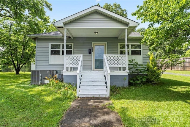 935 Church St, Kings Mountain, NC 28086 - bungalow with covered porch, central air condition unit, roof with shingles, and crawl space
